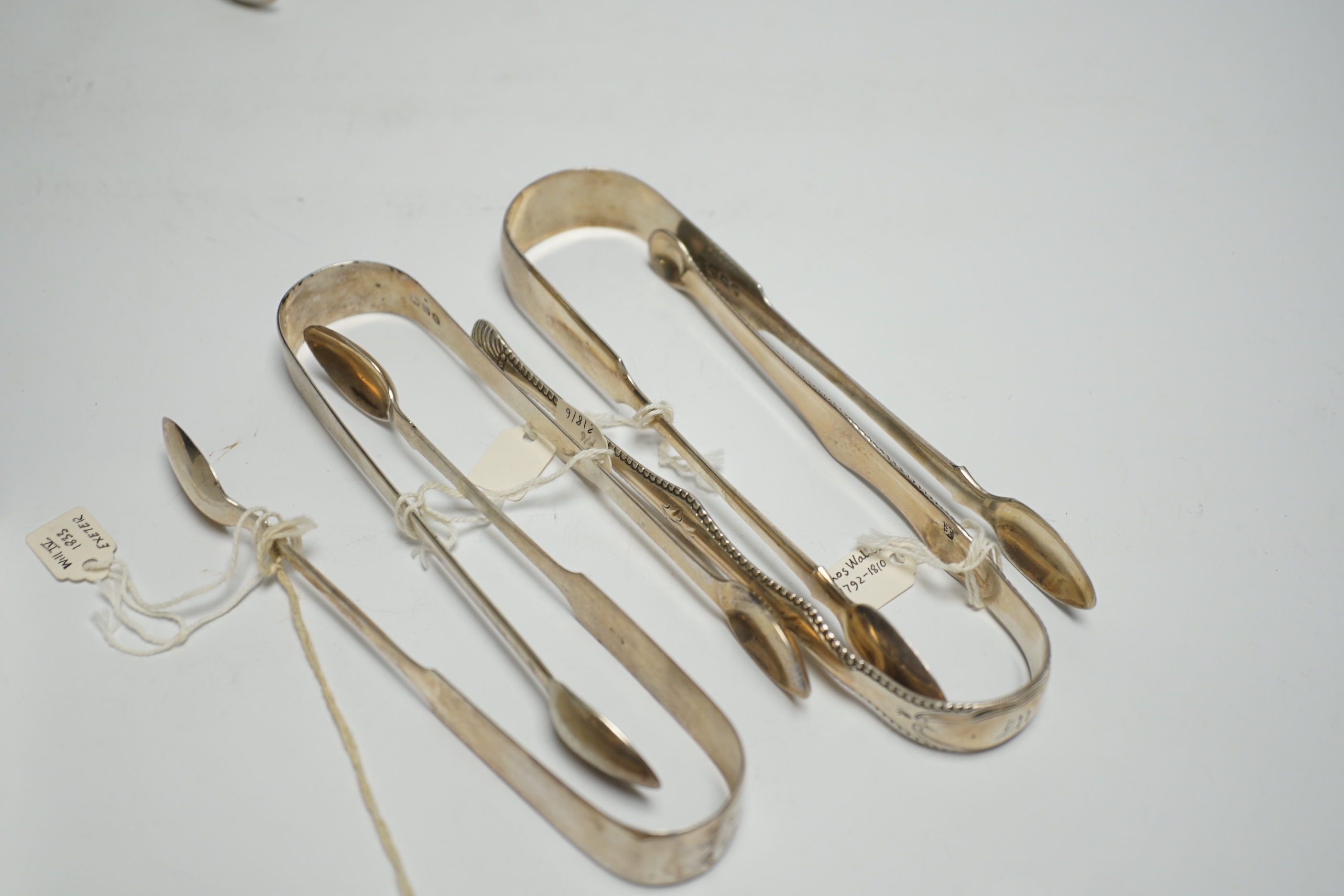 Eight assorted pairs of 18th and 19th century silver sugar tongs including Peter & Ann Bateman.